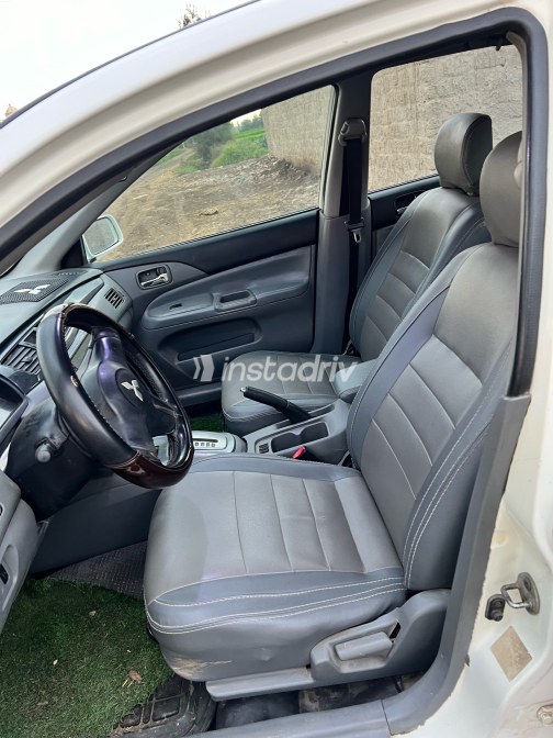 Mitsubishi Lancer Puma 2009 White Automatic Used for Sale in Greater Cairo ( Cairo + Giza) - 2