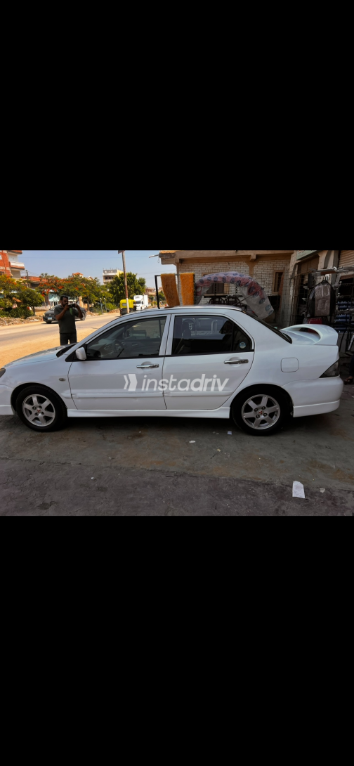 Mitsubishi Lancer Puma 2009 White Automatic Used for Sale in Greater Cairo ( Cairo + Giza) - 3
