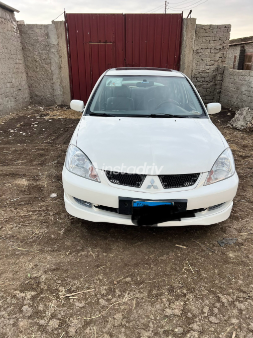 Mitsubishi Lancer Puma 2009 White Automatic Used for Sale in Greater Cairo ( Cairo + Giza) - 6