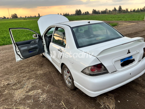Mitsubishi Lancer Puma 2009 White Automatic Used for Sale in Greater Cairo ( Cairo + Giza) - 8