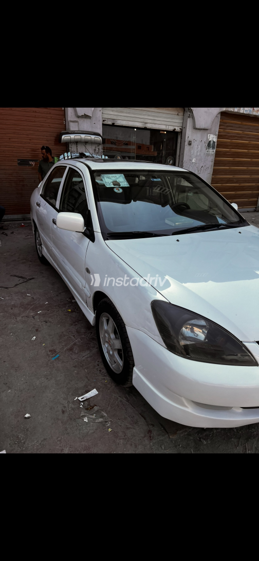 Mitsubishi Lancer Puma 2009 White Automatic Used for Sale in Greater Cairo ( Cairo + Giza) - 9