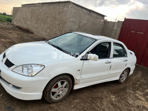 Mitsubishi Lancer Puma 2009 White Automatic Used for Sale in Greater Cairo ( Cairo + Giza) - 10