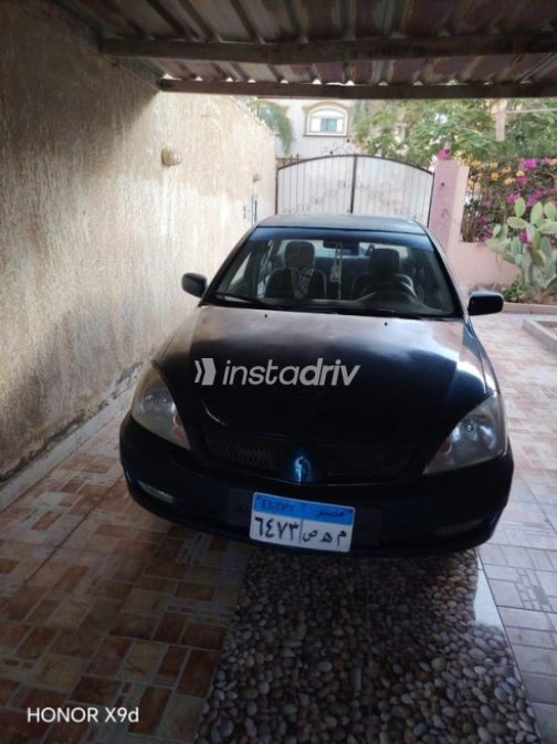 Mitsubishi Lancer Puma 2008 Blue Manual Used for Sale in Sadat City - 7