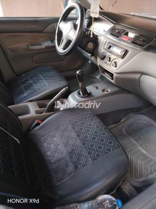 Mitsubishi Lancer Puma 2008 Blue Manual Used for Sale in Sadat City - 8