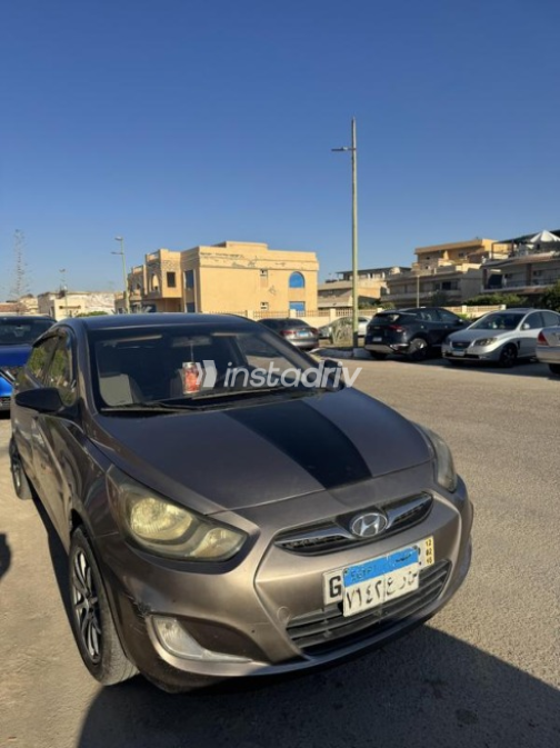 هيونداي اكسنت RB 2011 برونزي يدوي مستعملة للبيع في الإسكندرية - 6
