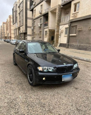بي ام دبليو 318 2003 أسود أوتوماتيك مستعملة للبيع في القاهرة