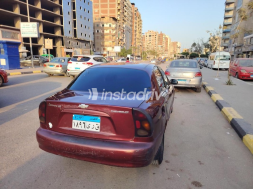 شيفروليه لانوس 2013 أحمر غامق يدوي مستعملة للبيع في بنها - 9