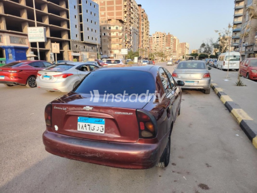 شيفروليه لانوس 2013 أحمر غامق يدوي مستعملة للبيع في بنها - 10