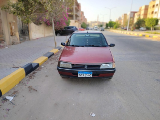 بيجو 505 1995 أحمر غامق يدوي مستعملة للبيع في القاهرة