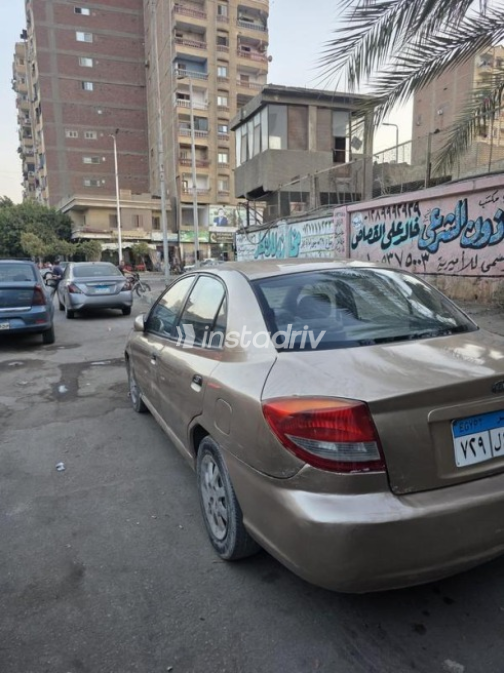 كيا ريو 2003 ذهبي يدوي مستعملة للبيع في القاهرة - 2