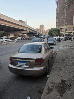 كيا ريو 2003 ذهبي يدوي مستعملة للبيع في القاهرة