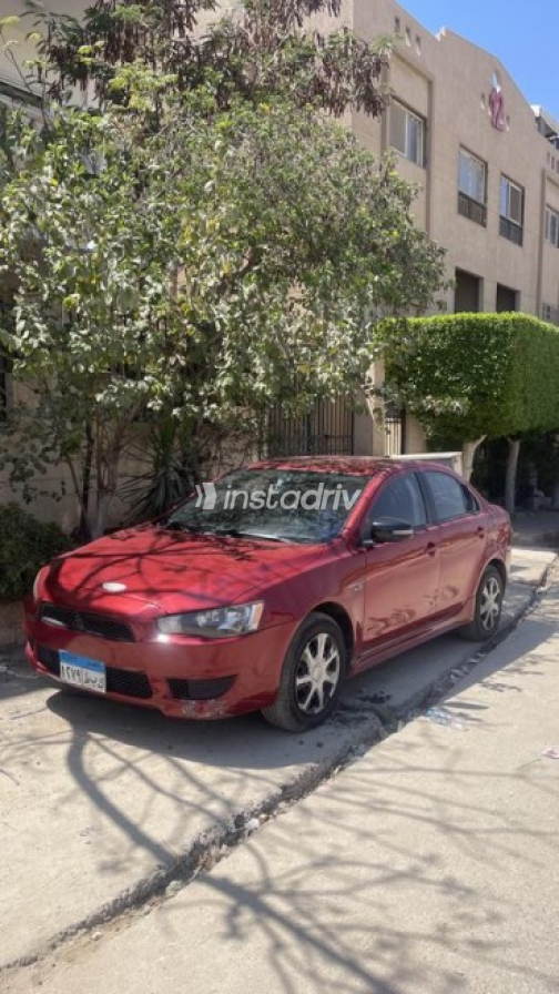 ميتسوبيشي لانسر اى اكس شارك 2016 أحمر أوتوماتيك مستعملة للبيع في القاهرة - 2