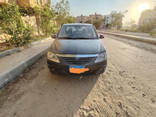 رينو لوجان 2012 رمادي غامق يدوي مستعملة للبيع في العبور