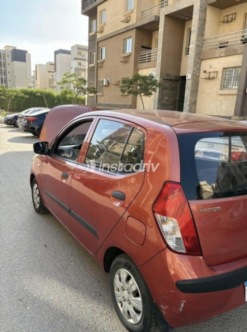 هيونداي I10 2010 أحمر أوتوماتيك مستعملة للبيع في 6 أكتوبر - 3