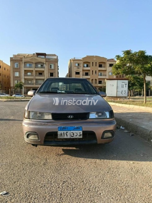 هيونداي اكسيل 1996 برونزي يدوي مستعملة للبيع في الشروق - 1