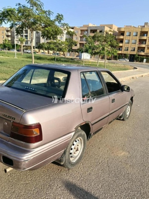 هيونداي اكسيل 1996 برونزي يدوي مستعملة للبيع في الشروق - 4