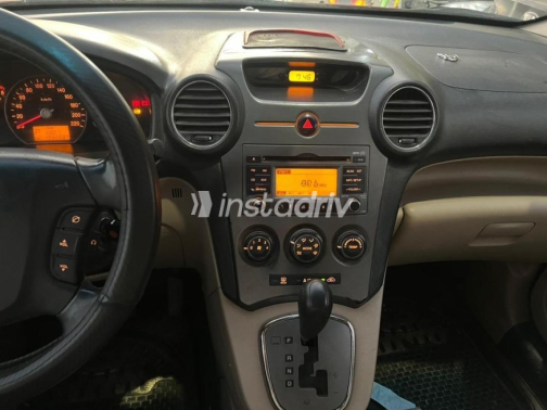 Kia Carens 2011 Red Automatic Used for Sale in El Mahalla - 3