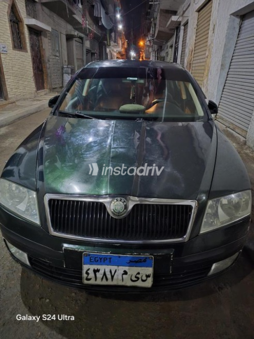 سكودا اوكتافيا A5 2005 أخضر غامق يدوي مستعملة للبيع في الإسكندرية - 8