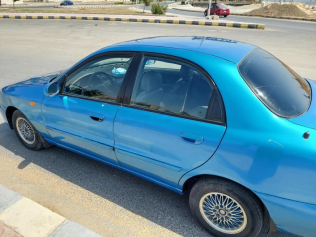دايو لانوس 2 2003 أزرق يدوي مستعملة للبيع في المنيا‎