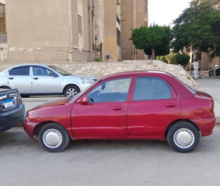 Mazda 121 1997 Red Manual Used for Sale in Cairo