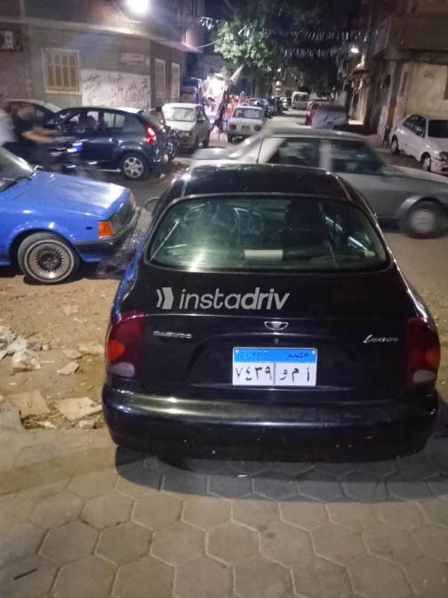 دايو لانوس 2 2005 أسود يدوي مستعملة للبيع في القاهرة الكبرى ( القاهرة - الجيزة) - 6
