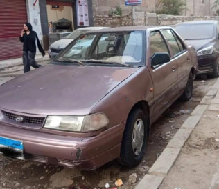 هيونداي اكسيل 1998 برونزي يدوي مستعملة للبيع في أسيوط