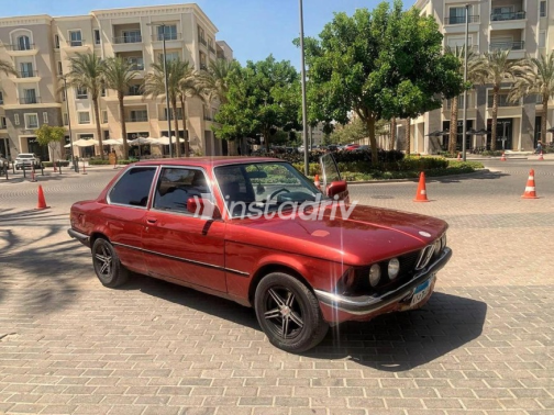 بي ام دبليو 318 1981 أحمر غامق يدوي مستعملة للبيع في القاهرة الكبرى ( القاهرة - الجيزة) - 1