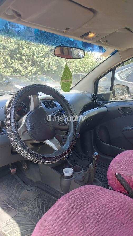 Chevrolet Spark 2011 Black Manual Used for Sale in Greater Cairo ( Cairo + Giza) - 1