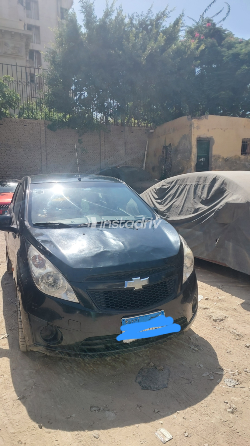 Chevrolet Spark 2011 Black Manual Used for Sale in Greater Cairo ( Cairo + Giza) - 4