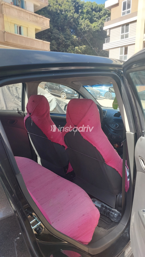 Chevrolet Spark 2011 Black Manual Used for Sale in Greater Cairo ( Cairo + Giza) - 7