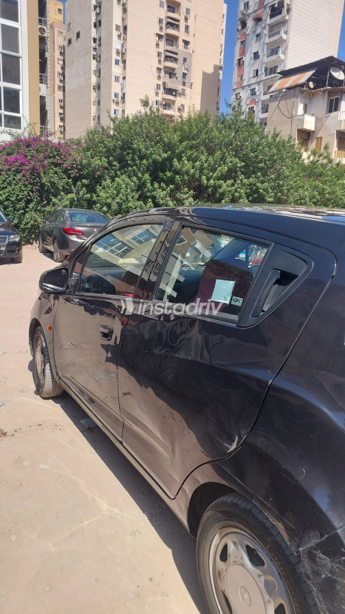 Chevrolet Spark 2011 Black Manual Used for Sale in Greater Cairo ( Cairo + Giza) - 9