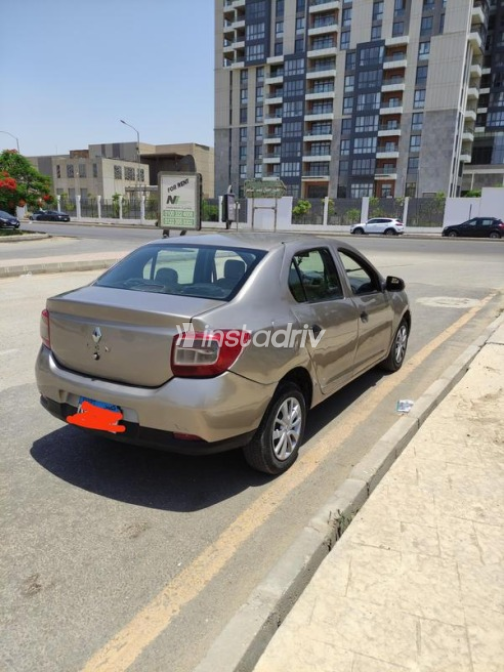 Renault Logan 2016 Gold Manual Used for Sale in Cairo - 2