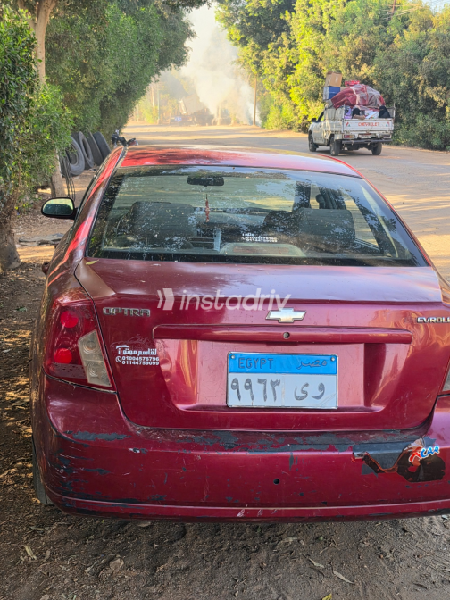 شيفروليه أوبترا 2011 أحمر أوتوماتيك مستعملة للبيع في القاهرة الكبرى ( القاهرة - الجيزة) - 6