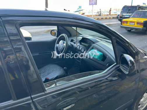 Chevrolet Spark 2011 Black Manual Used for Sale in Alexandria - 5