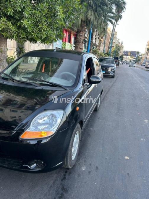 Chevrolet Spark 2011 Black Manual Used for Sale in Alexandria - 7