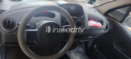 Chevrolet Spark 2011 Black Manual Used for Sale in Alexandria - 10