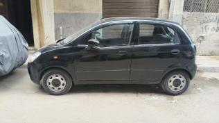 Chevrolet Spark 2011 Black Manual Used for Sale in Alexandria