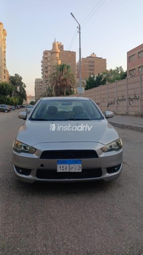 ميتسوبيشي لانسر 2015 فضي أوتوماتيك مستعملة للبيع في مصر الجديدة - 4