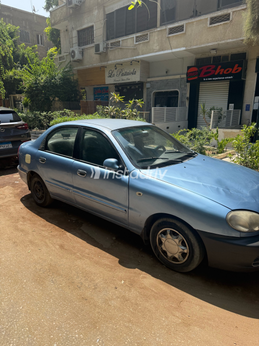 دايو لانوس 2 2004 أبيض يدوي مستعملة للبيع في القاهرة الكبرى ( القاهرة - الجيزة) - 2
