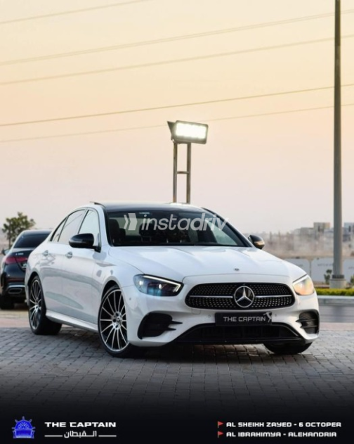 مرسيدس E 200 2021 أبيض أوتوماتيك مستعملة للبيع في مدينة الشيخ زايد - 1