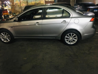 Mitsubishi Lancer EX Shark 2015 Gold Automatic Used for Sale in Ismailia