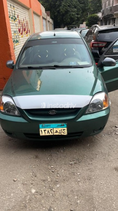 Kia Rio 2004 Dark Green Manual Used for Sale in El Haram - 1