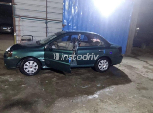 Kia Rio 2004 Dark Green Manual Used for Sale in El Haram - 4