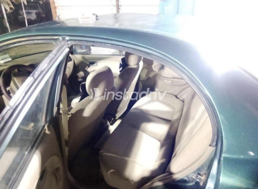 Kia Rio 2004 Dark Green Manual Used for Sale in El Haram - 9
