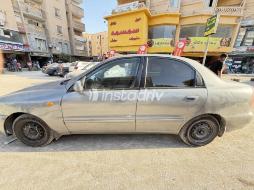 شيفروليه لانوس 2012 رمادي غامق يدوي مستعملة للبيع في الجيزة - 3