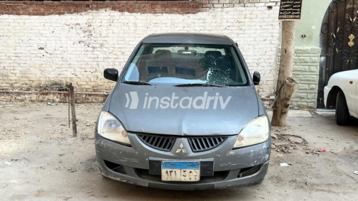 Mitsubishi Lancer Puma 2006 Dark Gray Manual Used for Sale in Nasr city - 2