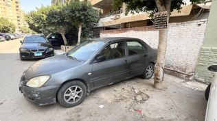 Mitsubishi Lancer Puma 2006 Dark Gray Manual Used for Sale in Nasr city