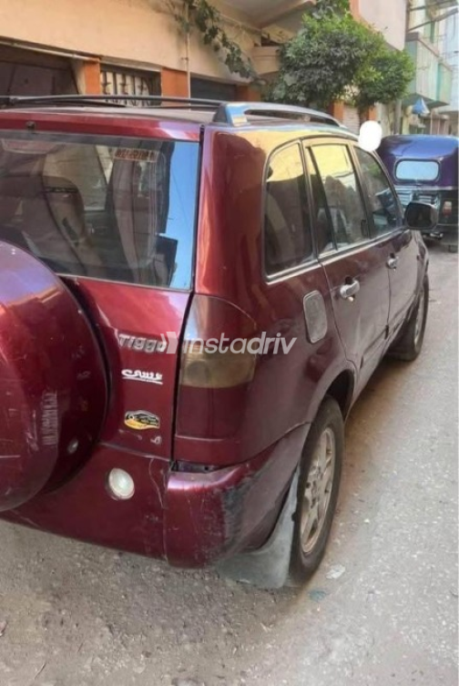 Speranza Tiggo 2010 Dark Red Manual Used for Sale in Kafr El Zayat - 7