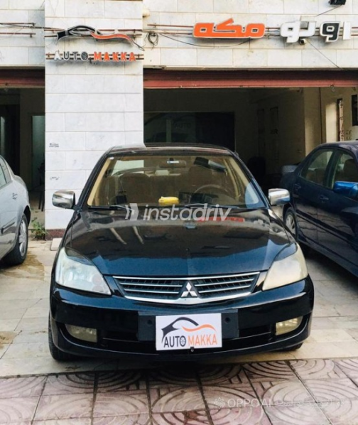 Mitsubishi Lancer 2009 Black Manual Used for Sale in Maadi - 1