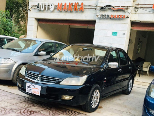 Mitsubishi Lancer 2009 Black Manual Used for Sale in Maadi - 2